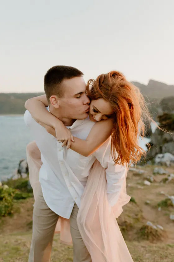 Couple embracing near the coast